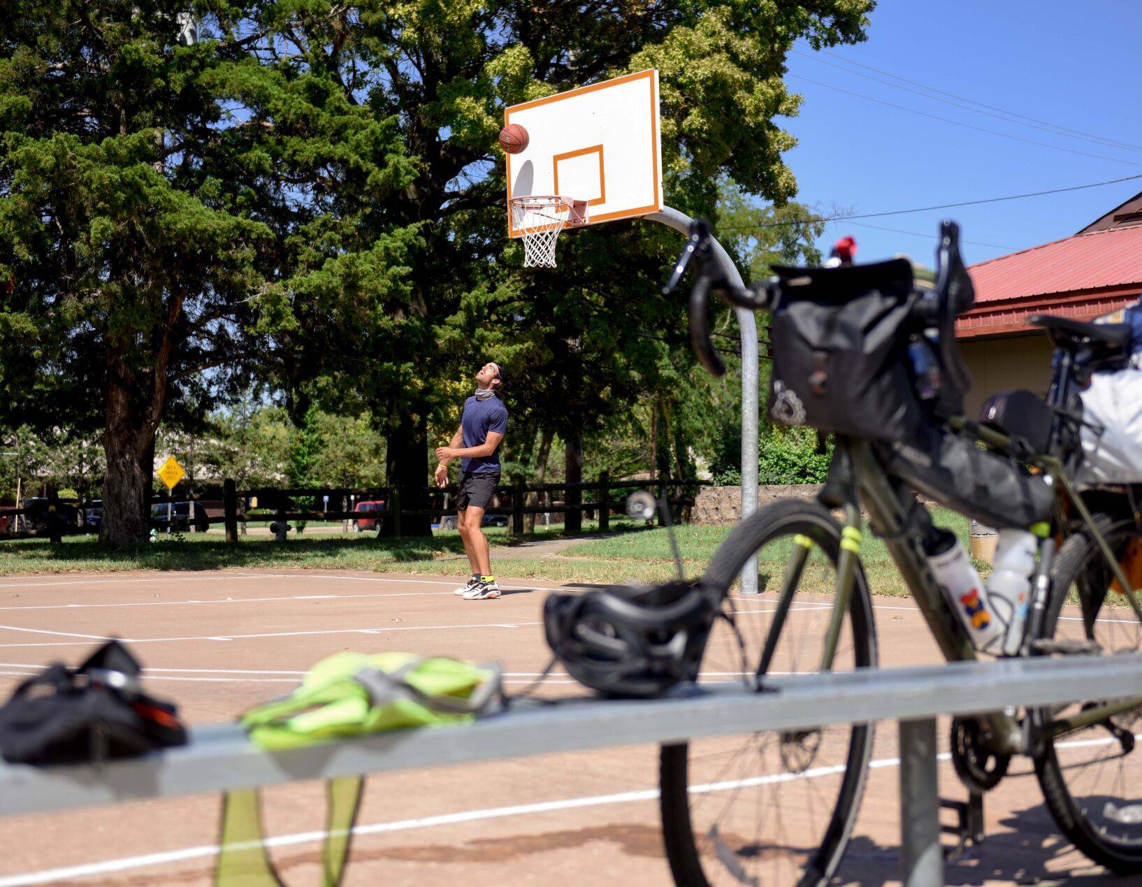 Leo Walsh plays basketball at Douglass Park on Friday in Columbia